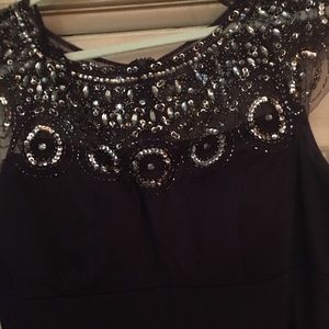Women’s Formal Dress in Eggplant Color.